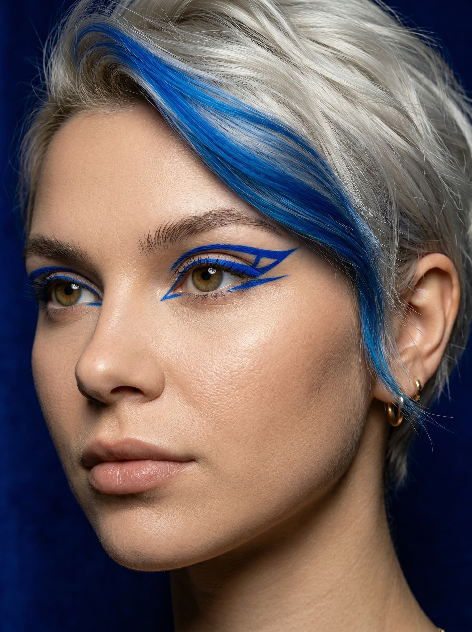 Avant-garde Beauty Editorial – Electric Blue Liner, Platinum Pixie